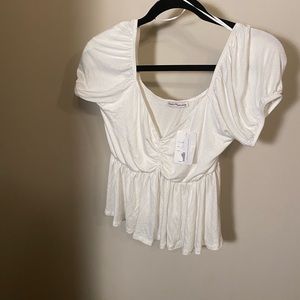 Dainty hooligan flowy top